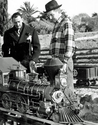 Walt shows off his backyard train set for Salvador Dali