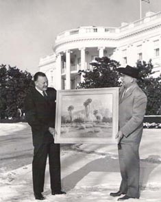 John W Hilton donating a painting to Dwight Eisenhower at the White Hosue 1957