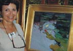 Jeanette Legrue and her painting Lillies Thumbnail