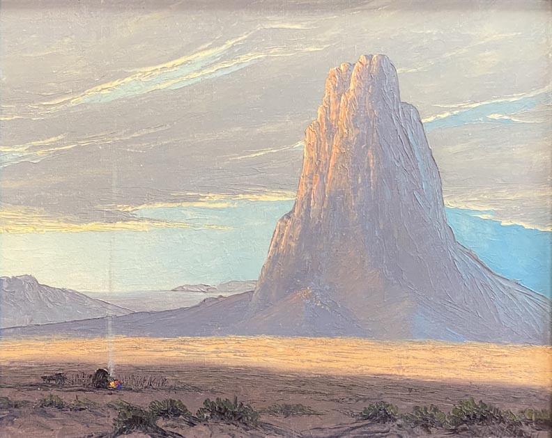 John W Hilton, Monumnet, a prospector figure is in the foreground left with a campfire, smoke rising to the heavens, in the background, a monument of Monument Valley, appearing as folded hands.  Across the center of the scene, a breadth of light illuminating the desert floor.