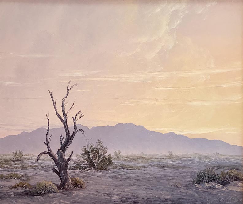 John W Hilton, Desert at Evening, an atmospheric desert scene in pinks, purples in the light just after sunsent.  a silhouetted dead tree with purple distant mountains backlit by the recent sun setting