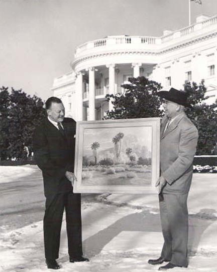 John W Hilton presenting a painting for Ikes Oval Office