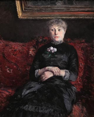 Woman Seated on a Red-Flowered Sofa, 1882 Gustave Caillebotte, French, 1848-1894