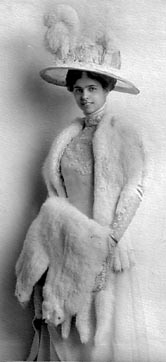 Orpha Klinker decked out in stylish plumes