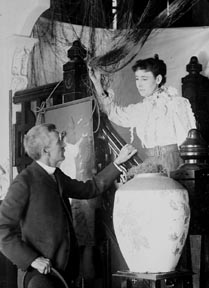 Frankllin and Henrietta Riddell Fish decorating their home