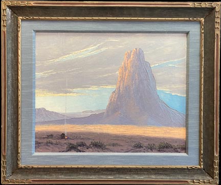 John W Hilton, Monumnet, a prospector figure is in the foreground left with a campfire, smoke rising to the heavens, in the background, a monument of Monument Valley, appearing as folded hands.  Across the center of the scene, a breadth of light illuminating the desert floor.